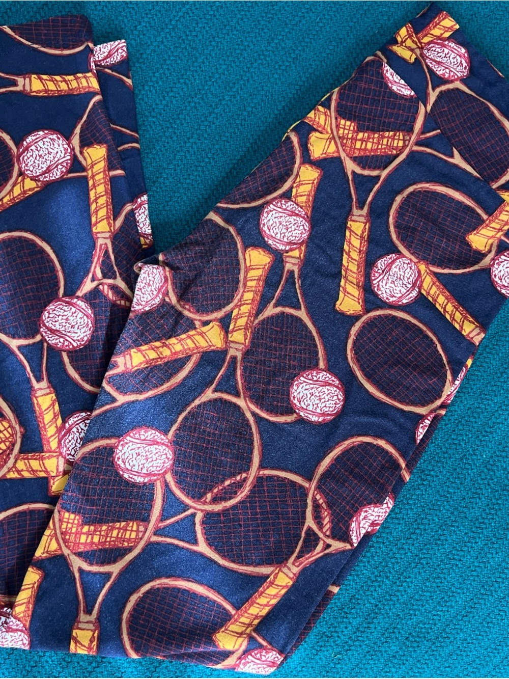 LuLaRoe Navy Leggings with Orange Tennis Racket & Pink Ball Print
